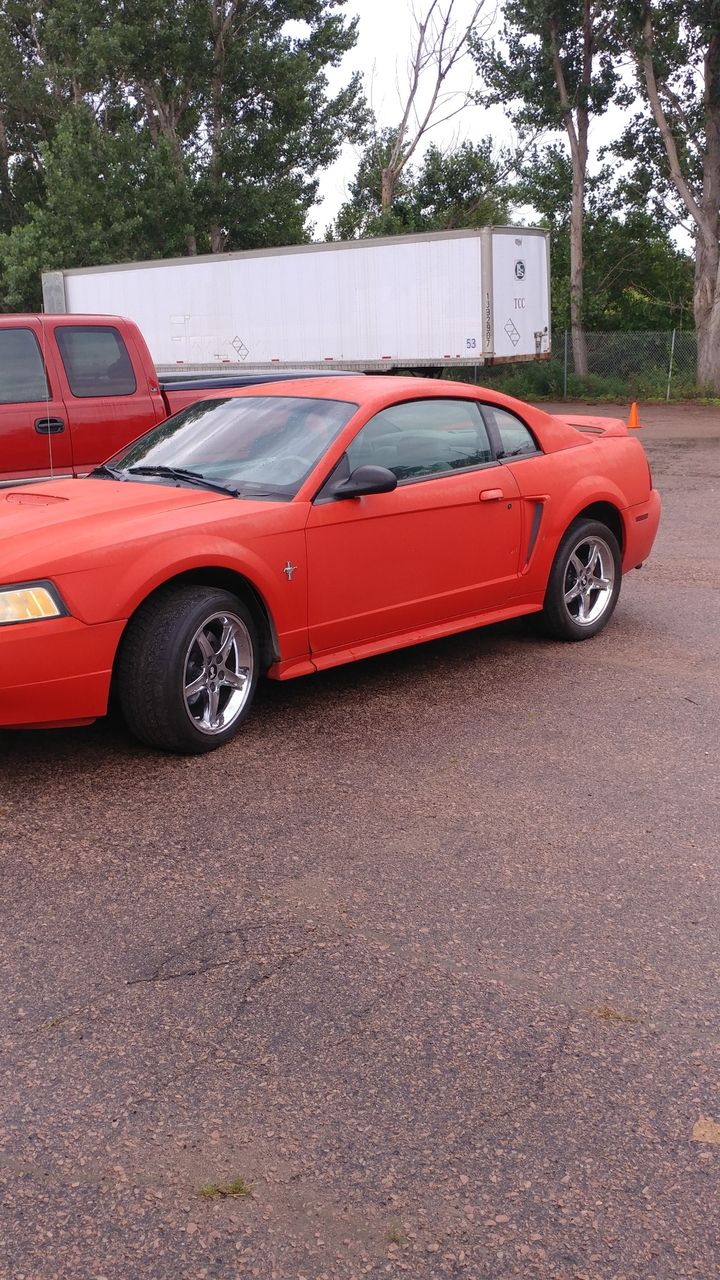 2000 Ford Mustang Base | Sioux Falls, SD, Performance Red Clearcoat (Red & Orange), Rear Wheel