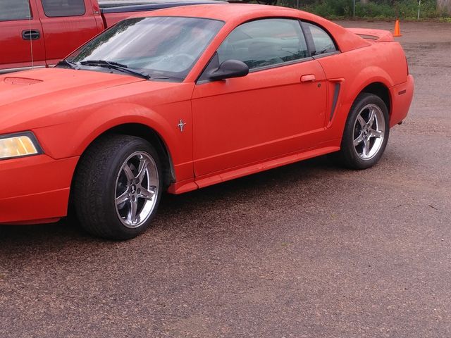 2000 Ford Mustang Base, Performance Red Clearcoat (Red & Orange), Rear Wheel