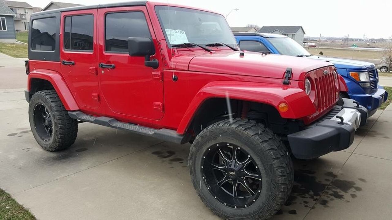 2011 Jeep Wrangler Unlimited Sahara | Sioux Falls, SD, Flame Red Clear Coat (Red & Orange), 4x4