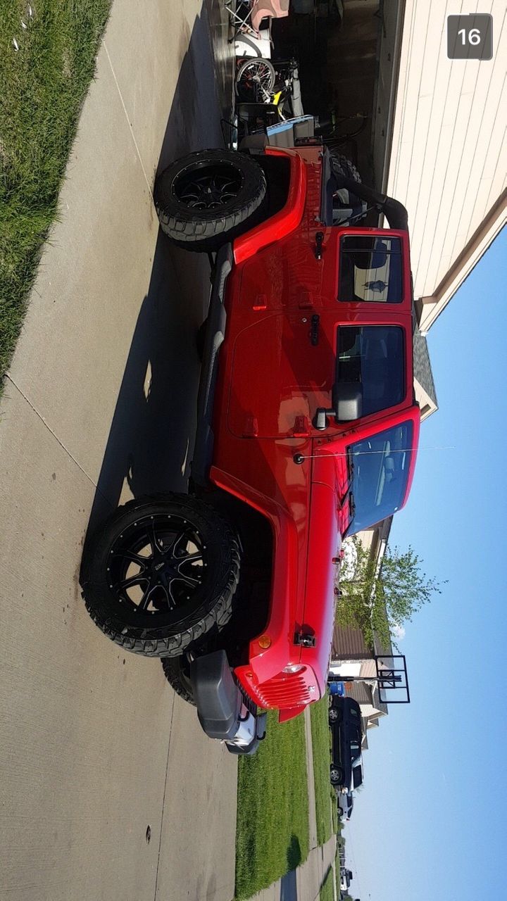 2011 Jeep Wrangler Unlimited Sahara | Sioux Falls, SD, Flame Red Clear Coat (Red & Orange), 4x4