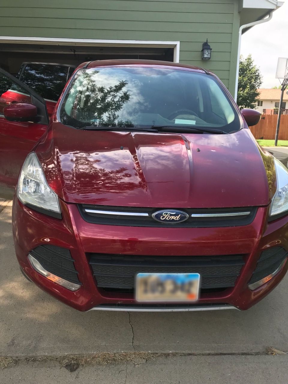 2015 Ford Escape SE | Tea, SD, Ruby Red Metallic Tinted Clearcoat (Red & Orange), Front Wheel