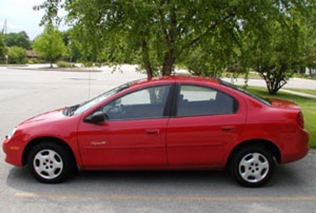 2000 Plymouth Neon | Sioux Falls, SD, Flame Red Clearcoat (Red & Orange), Front Wheel