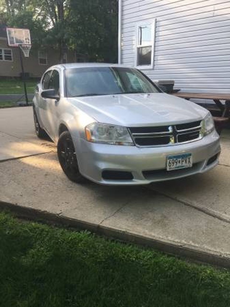 2011 Dodge Avenger | Hills, MN, Bright Silver Metallic Clear Coat (Silver), Front Wheel