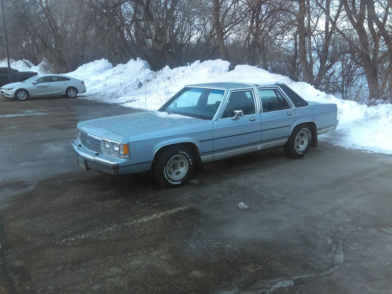 1991 Ford Crown Victoria | Madison, SD, Light Blue, Rear Wheel