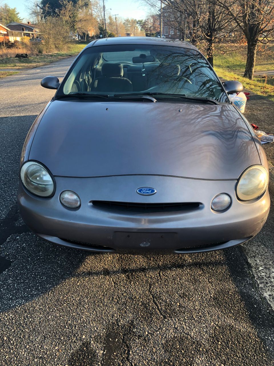 1996 Ford Taurus LX | Hickory, NC, Charcoal Grey Clearcoat Metallic (Gray), Front Wheel