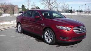 2013 Ford Taurus SEL | Sioux Falls, SD, Ruby Red Metallic Tinted Clear Coat (Red & Orange), Front Wheel