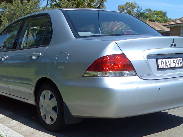 2005 Mitsubishi Lancer ES, Cool Silver Metallic (Silver), Front Wheel