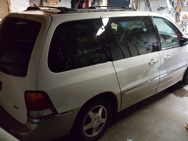 2000 Ford Windstar SEL, Vibrant White Clearcoat (White), Front Wheel