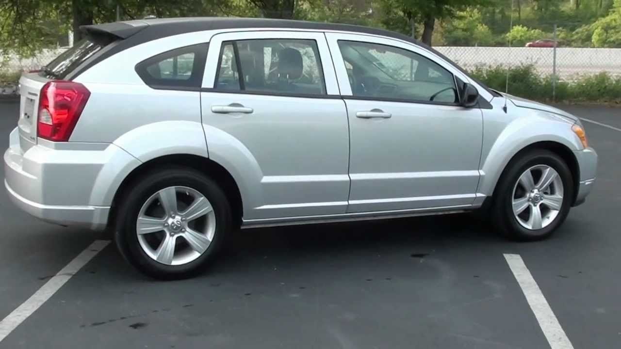 2010 Dodge Caliber SXT | Sioux Falls, SD, Dark Charcoal Pearl Coat (Gray), Front Wheel