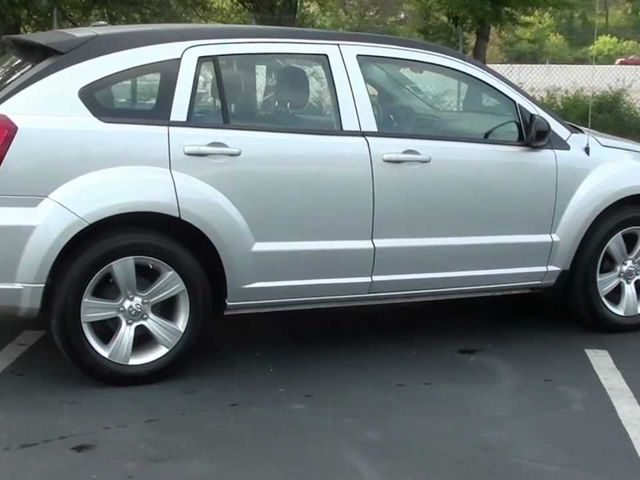 2010 Dodge Caliber SXT, Dark Charcoal Pearl Coat (Gray), Front Wheel