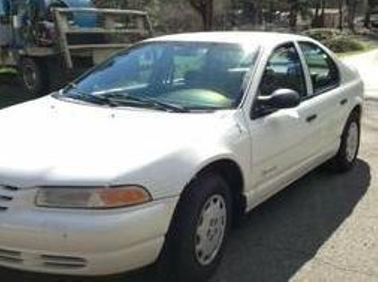 1998 Plymouth Breeze | Sioux Falls, SD, White, Front Wheel