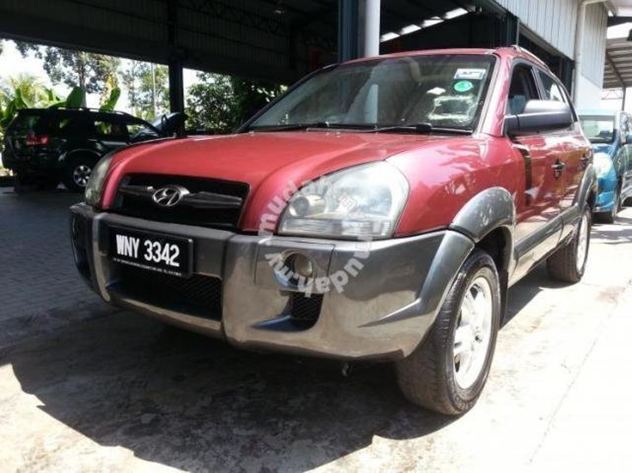 2006 Hyundai Tucson GLS | Sioux Falls, SD, Mesa Red (Red & Orange), Front Wheel