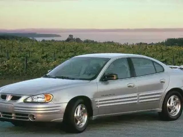 1999 Pontiac Grand Am SE, Silvermist Metallic (Silver), Front Wheel
