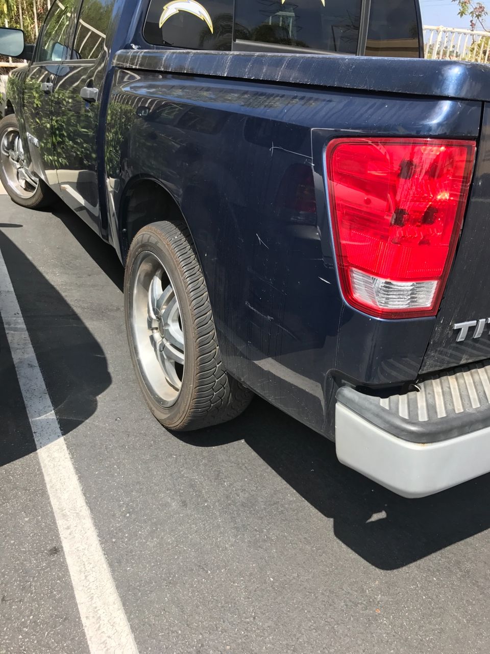 2006 Nissan Titan SE | Bonsall, CA, Majestic Blue (Blue), Rear Wheel