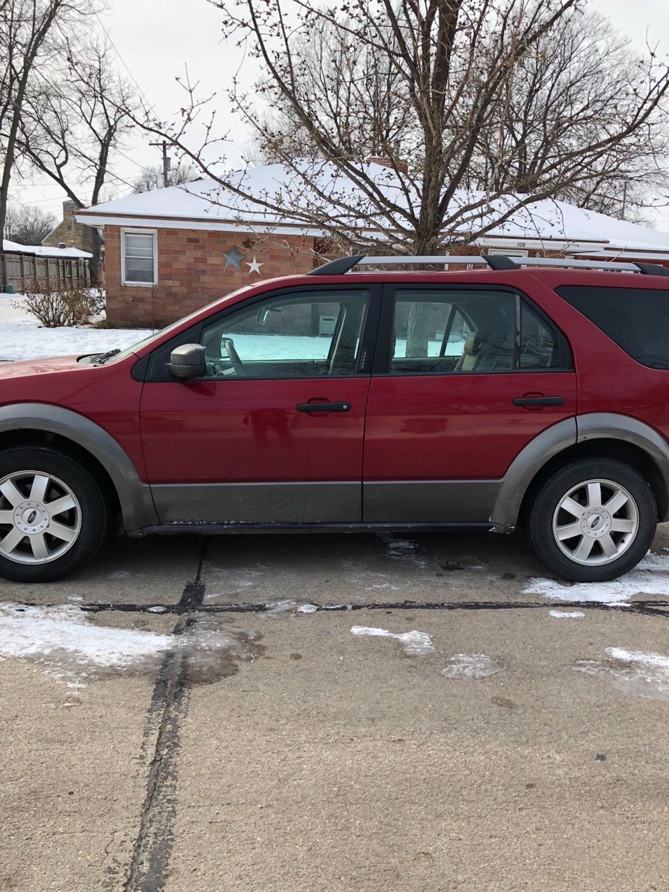 2006 Ford Freestyle SEL | Central City, NE, Redfire Clearcoat Metallic (Red & Orange), Front Wheel