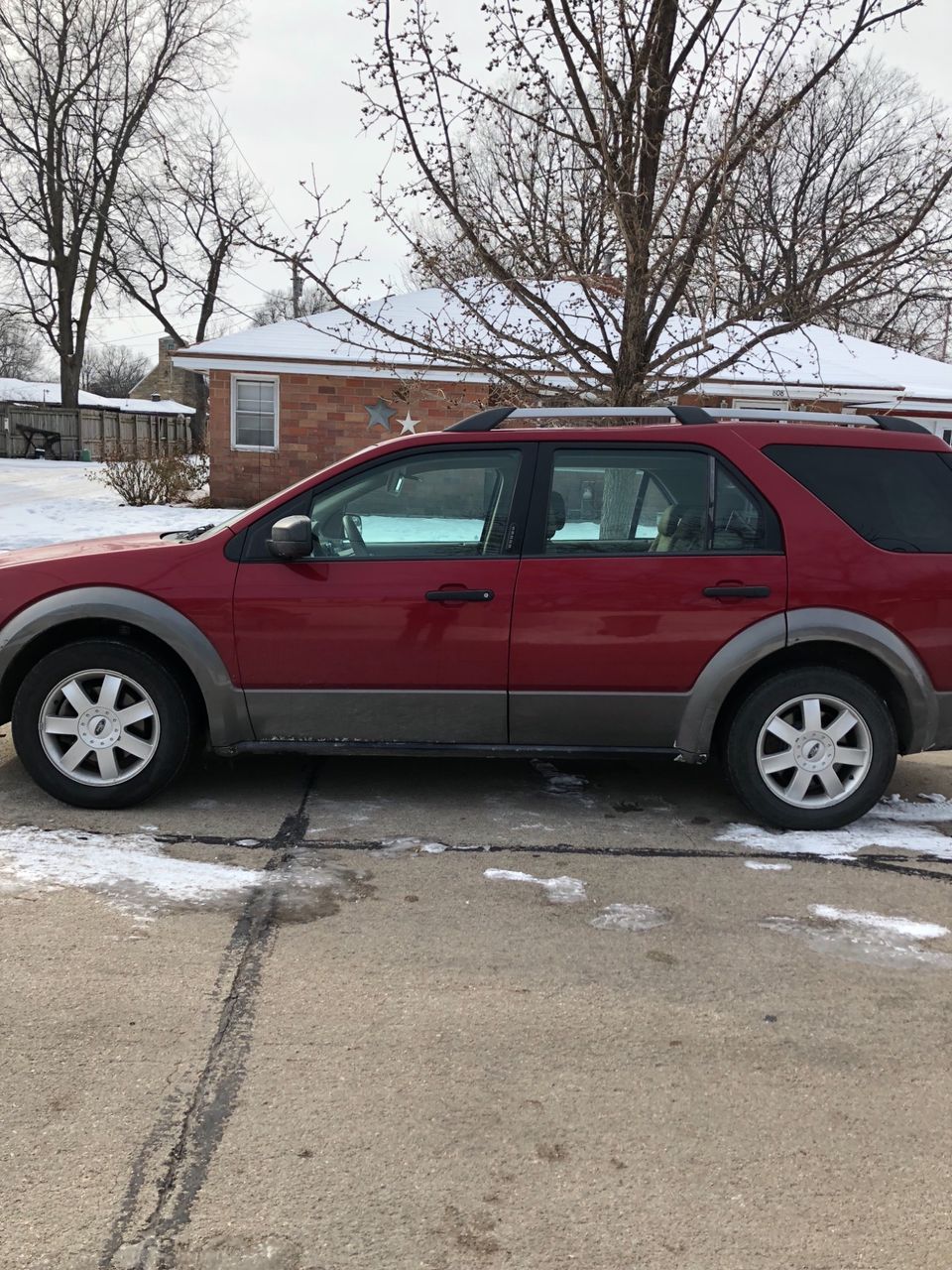 2006 Ford Freestyle SEL | Central City, NE, Redfire Clearcoat Metallic (Red & Orange), Front Wheel