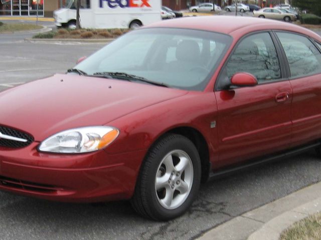 2001 Ford Taurus SES, Toreador Red Clearcoat Metallic (Red & Orange), Front Wheel