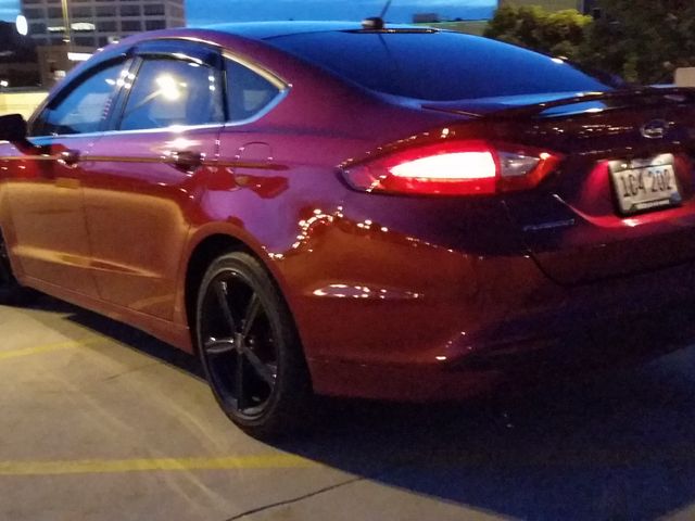 2016 Ford Fusion SE, Ruby Red Metallic Tinted Clearcoat (Red & Orange), Front Wheel