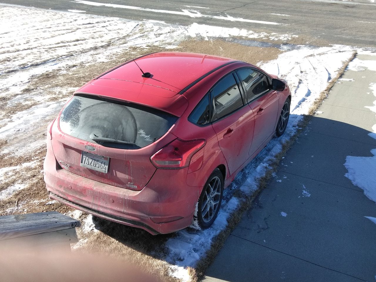 2016 Ford Focus SE | Elkton, SD, Ruby Red Metallic Tinted Clearcoat (Red & Orange), Front Wheel