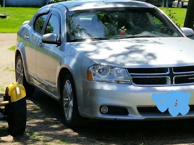 2011 Dodge Avenger Heat, Bright Silver Metallic Clear Coat (Silver), Front Wheel