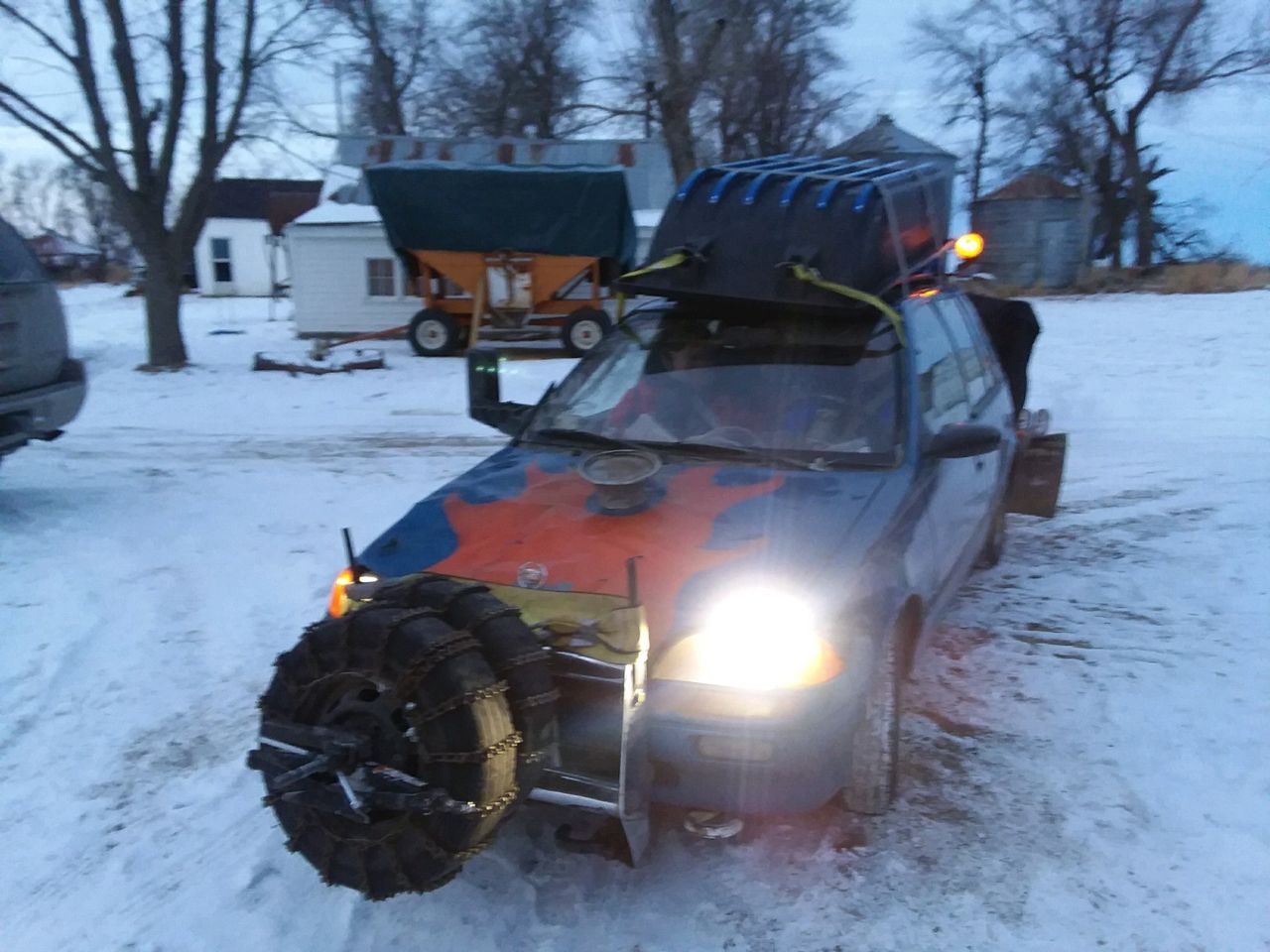 1994 Geo Metro Base | Kenneth, MN, Sky Blue Metallic (Blue), Front Wheel