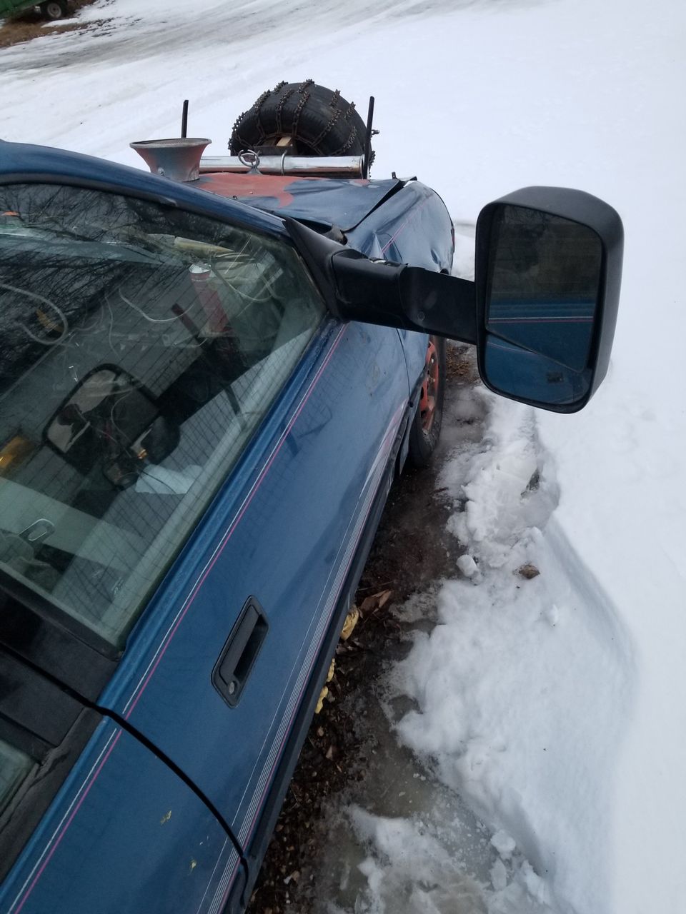 1994 Geo Metro Base | Kenneth, MN, Sky Blue Metallic (Blue), Front Wheel