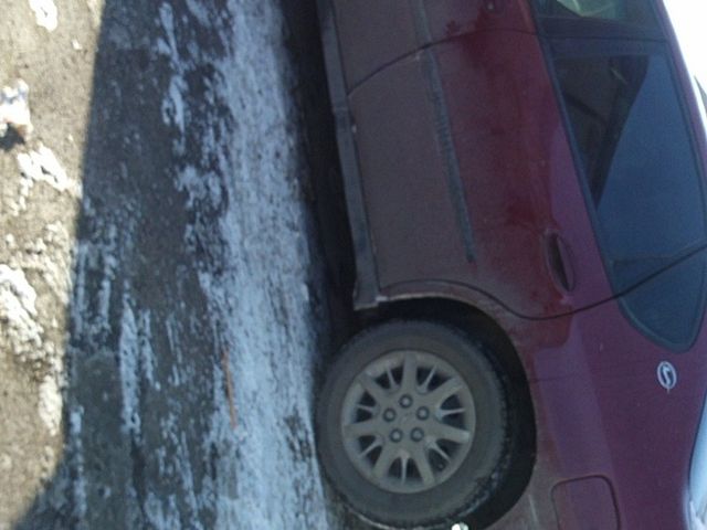 2005 Chevrolet Impala Base, Sport Red Metallic (Red & Orange), Front Wheel