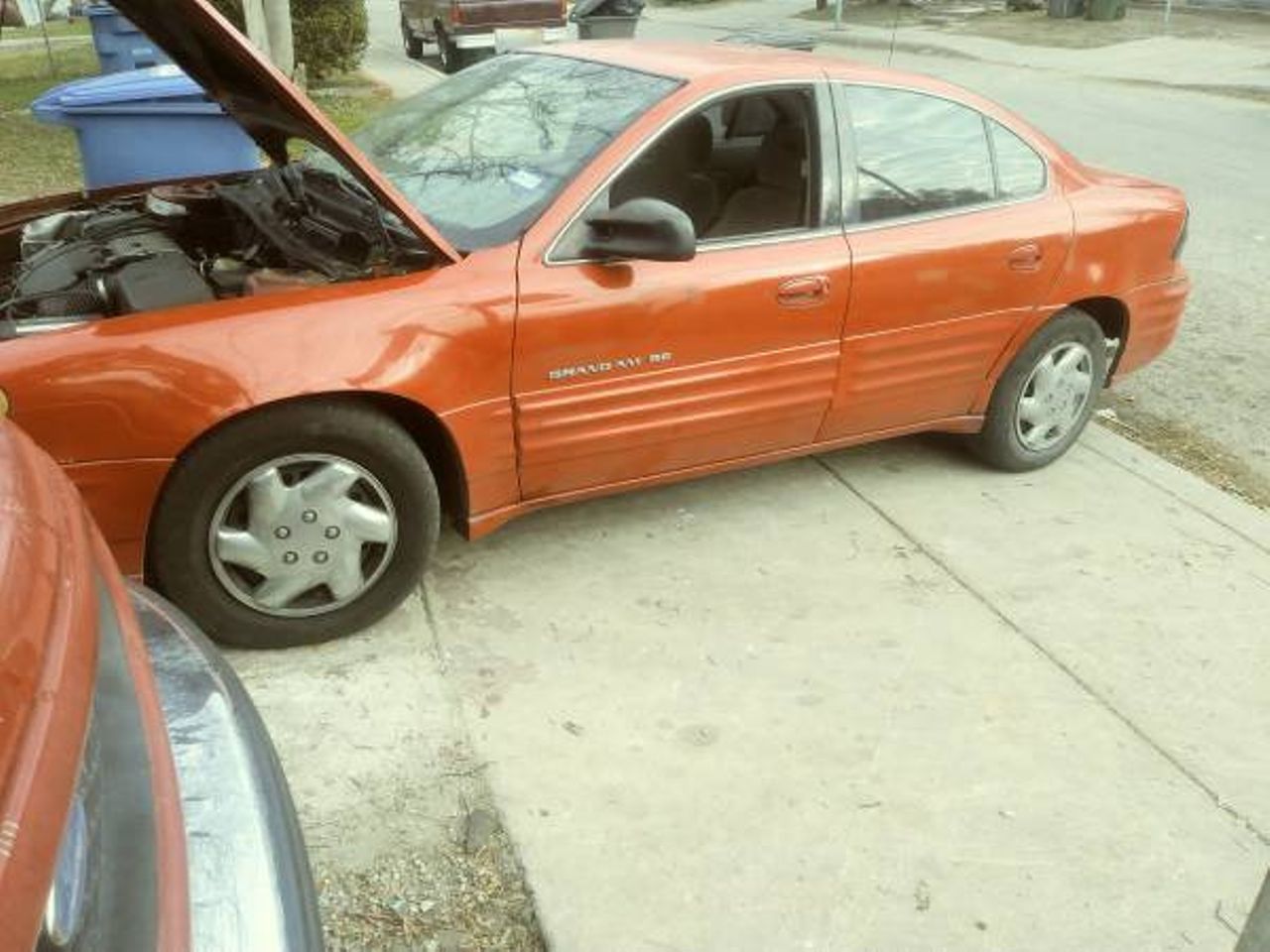 2000 Pontiac Grand Am SE1 | San Antonio, TX, Bright Red (Red & Orange), Front Wheel