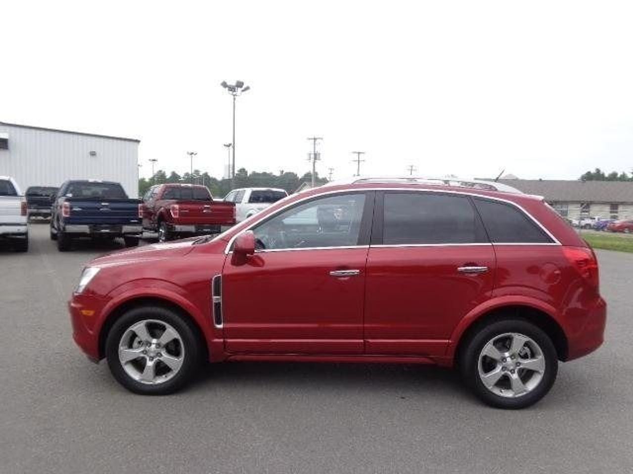 2013 Chevrolet Captiva Sport | Sioux Falls, SD, Crystal Red Tintcoat (Red & Orange), Front Wheel