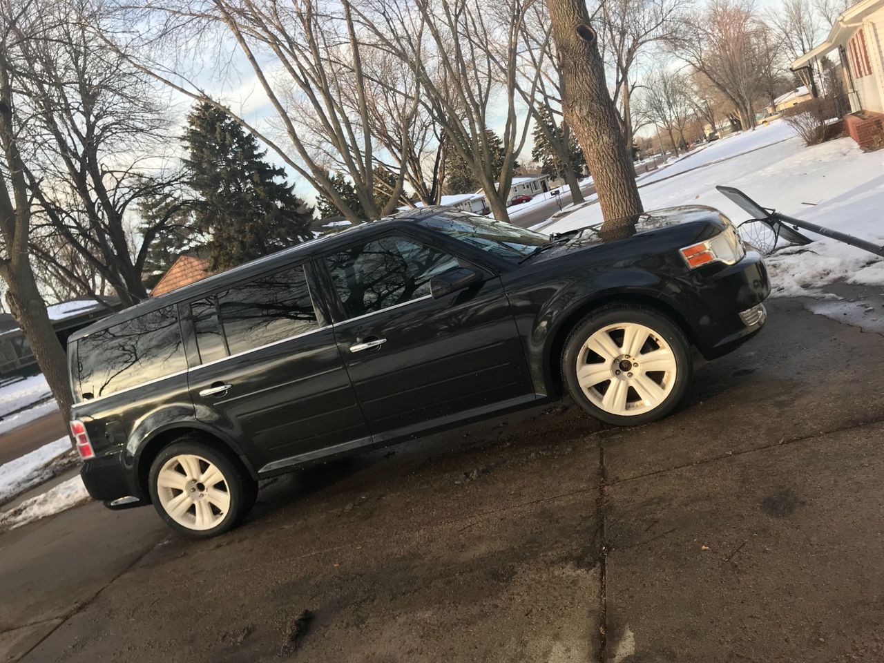 2010 Ford Flex SEL | Sioux Falls, SD, Tuxedo Black (Black), Front Wheel