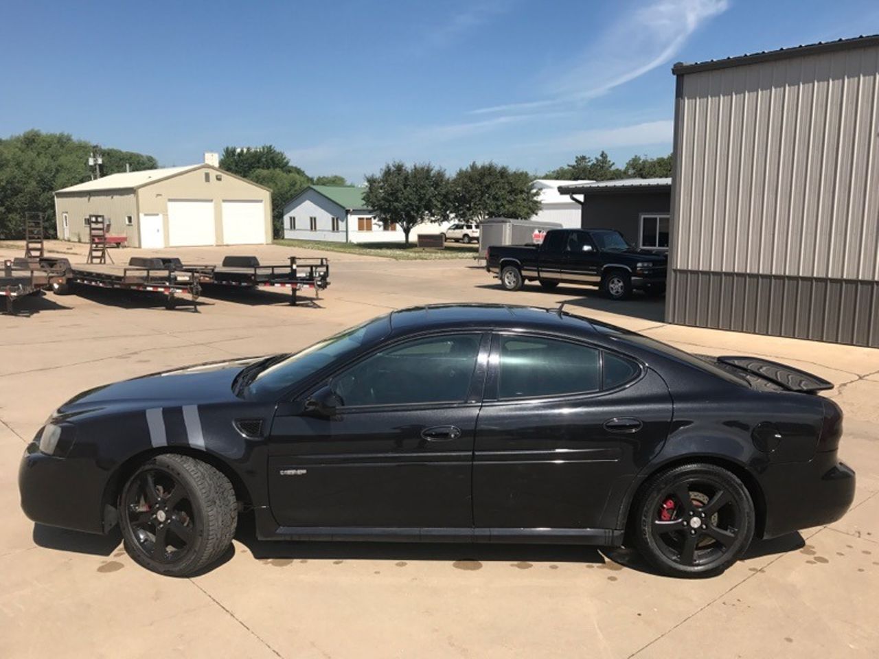 2006 Pontiac Grand Prix GXP | Hills, MN, Black (Black), Front Wheel