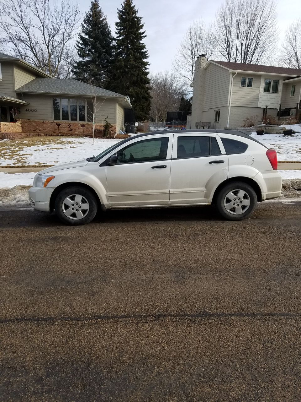 2008 Dodge Caliber SE | Sioux Falls, SD, Stone White Clear Coat (White), Front Wheel