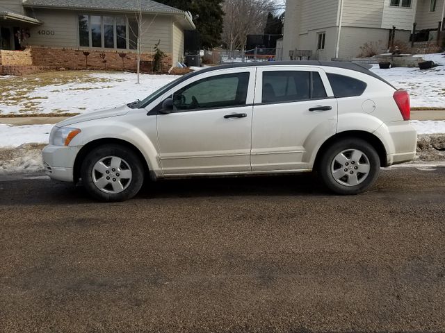 2008 Dodge Caliber SE, Stone White Clear Coat (White), Front Wheel