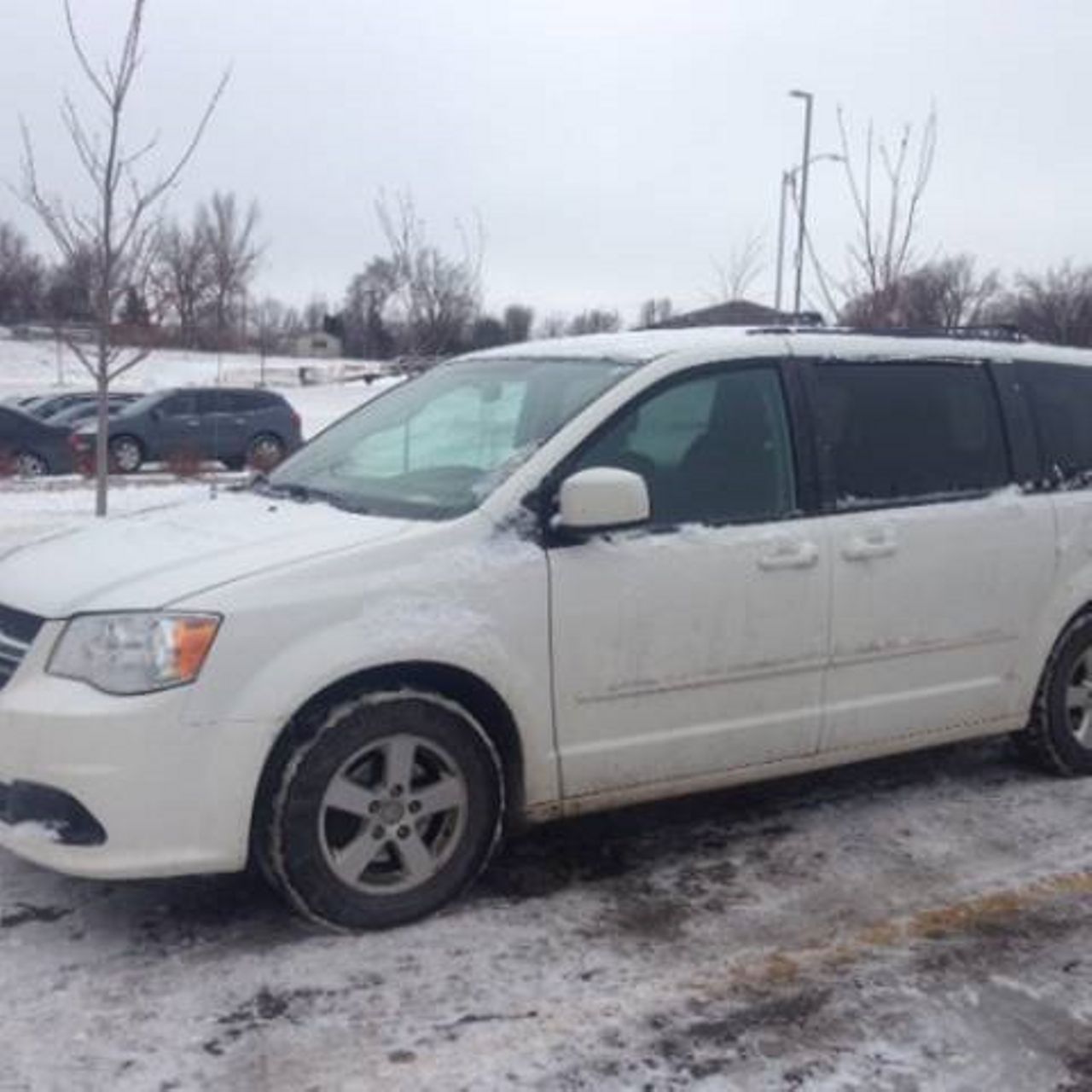 2011 Dodge Grand Caravan | Centerville, SD, Stone White Clear Coat (White), Front Wheel