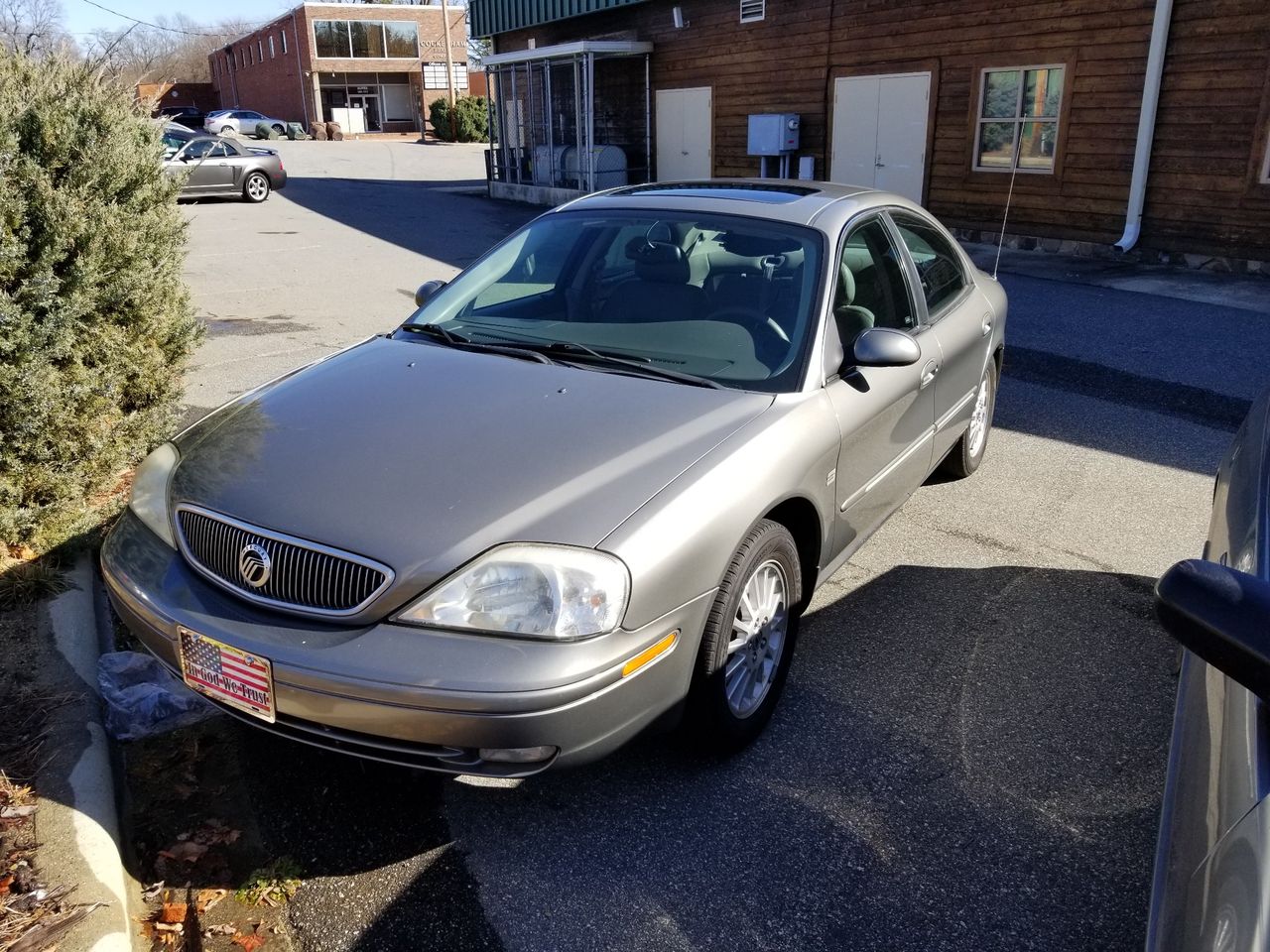 2003 Mercury Sable LS Premium | Greensboro, NC, Spruce Green Clearcoat Metallic (Green), Front Wheel