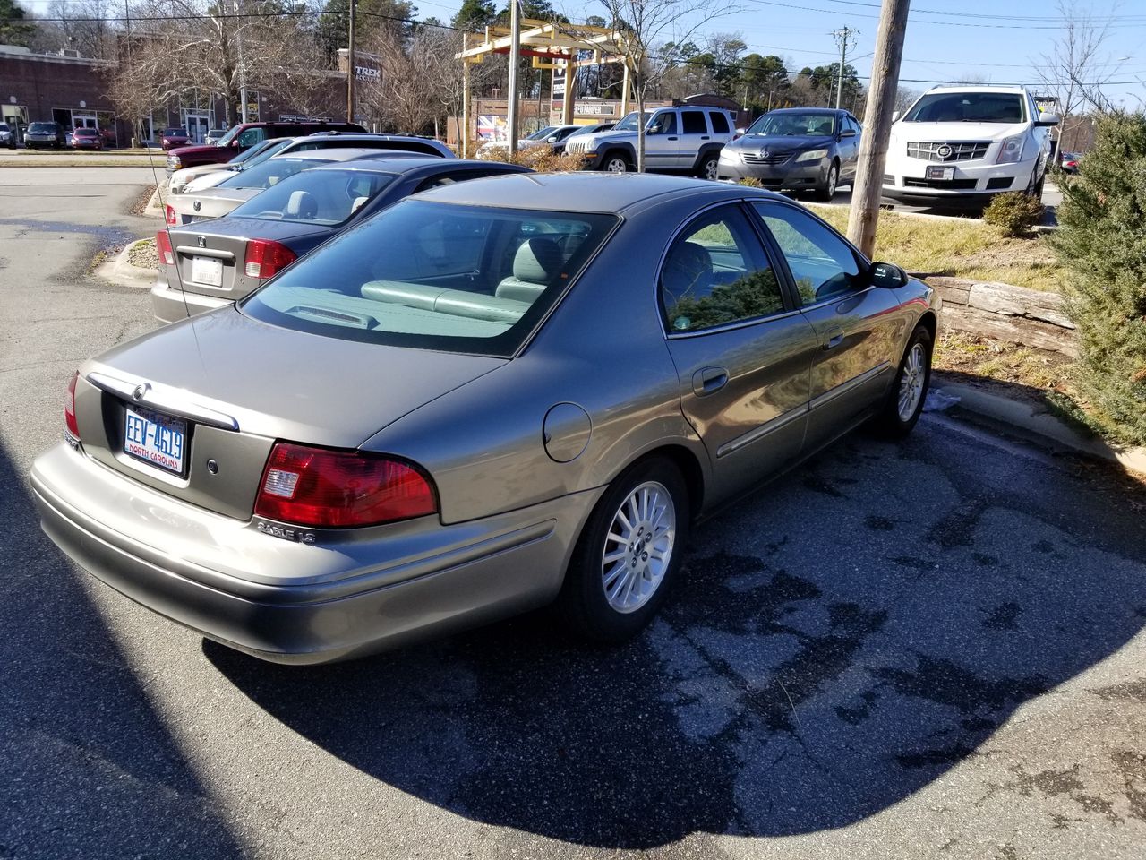 2003 Mercury Sable LS Premium | Greensboro, NC, Spruce Green Clearcoat Metallic (Green), Front Wheel