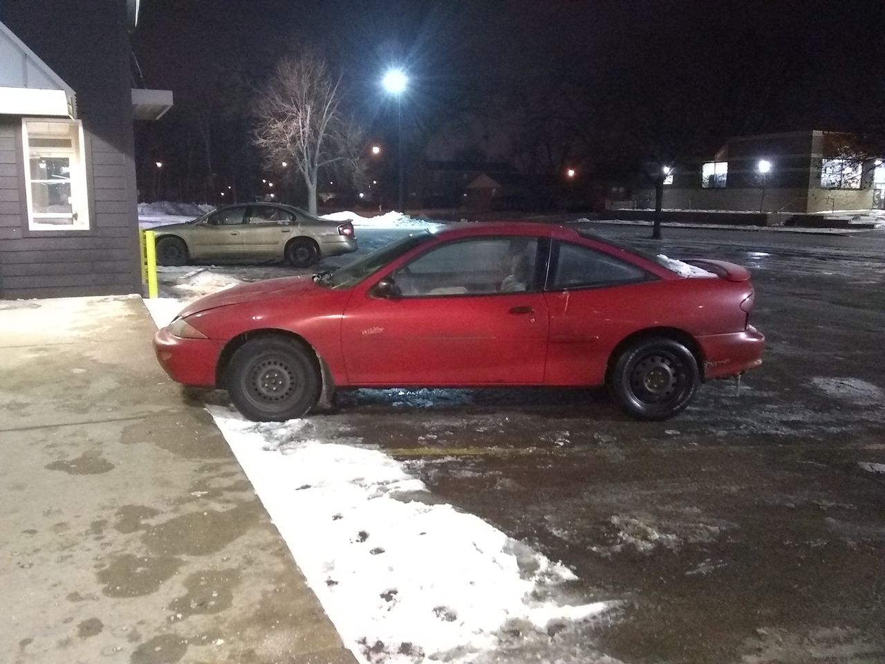 1997 Chevrolet Cavalier Base | Sioux Falls, SD, Bright Red (Red & Orange), Front Wheel