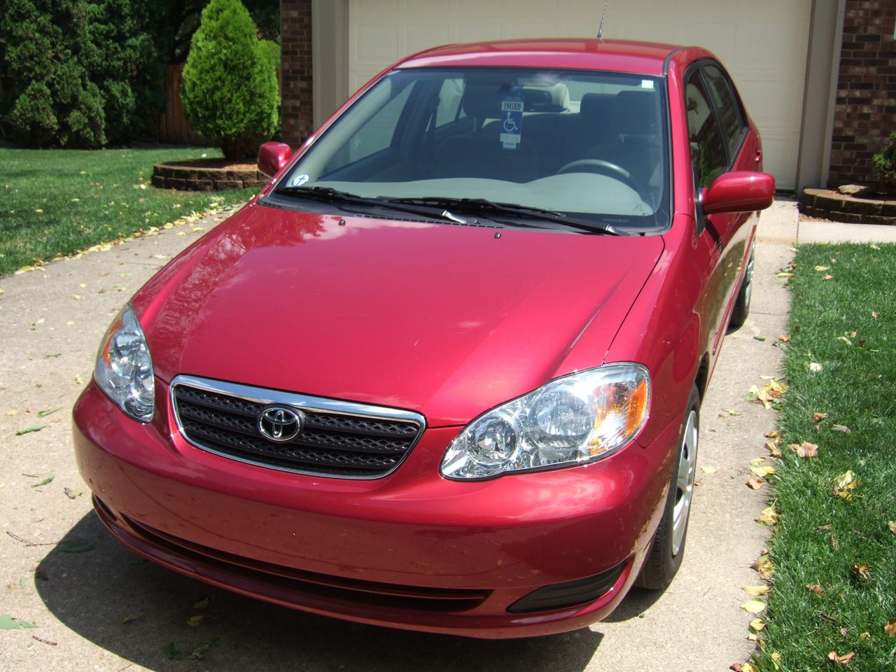 2007 Toyota Corolla LE | Fishers, IN, Impulse Red Pearl (Red & Orange), Front Wheel