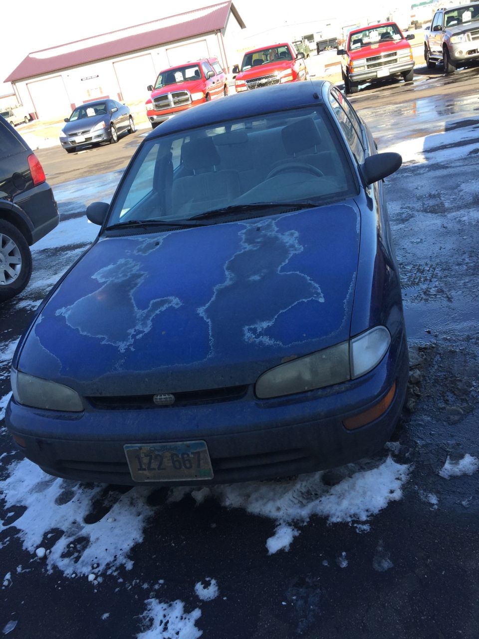 1996 Geo Prizm Base | Sioux Falls, SD, Pacific Blue Pearl Metallic (Blue), Front Wheel