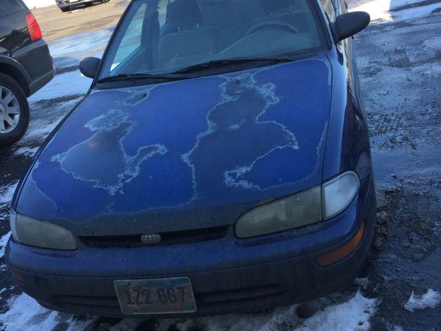 1996 Geo Prizm Base, Pacific Blue Pearl Metallic (Blue), Front Wheel