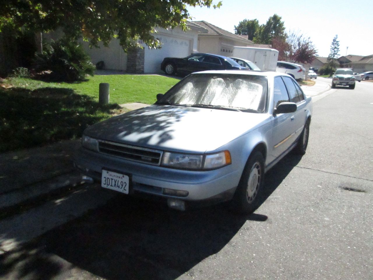 1991 Nissan Maxima GXE | Sacramento, CA, Satin White Pearlglow (White), Front Wheel