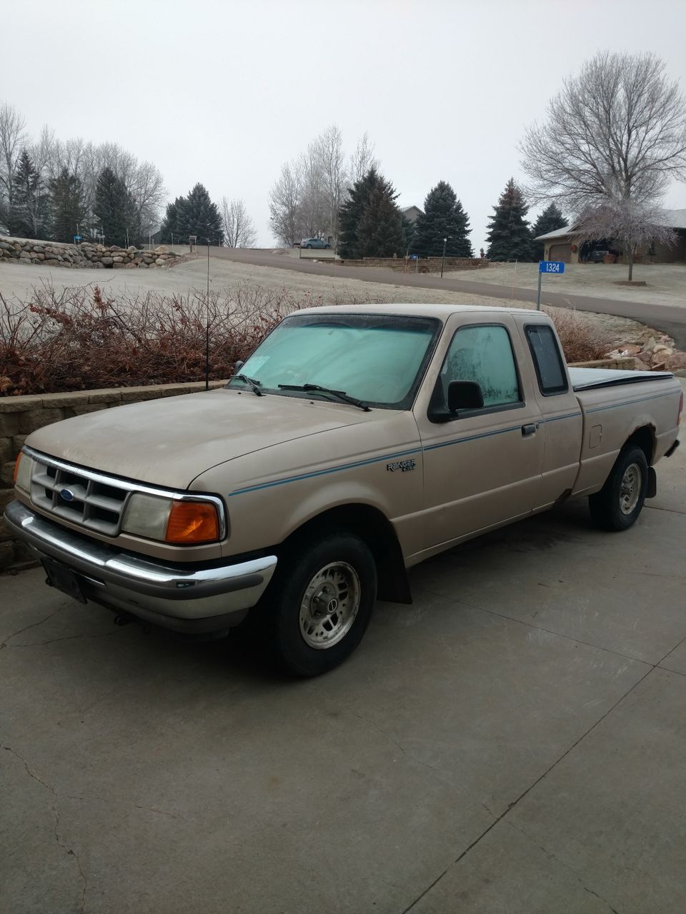 1994 Ford Ranger XLT | Sioux Falls, SD, Medium Mocha Metallic (Brown & Beige), Rear Wheel