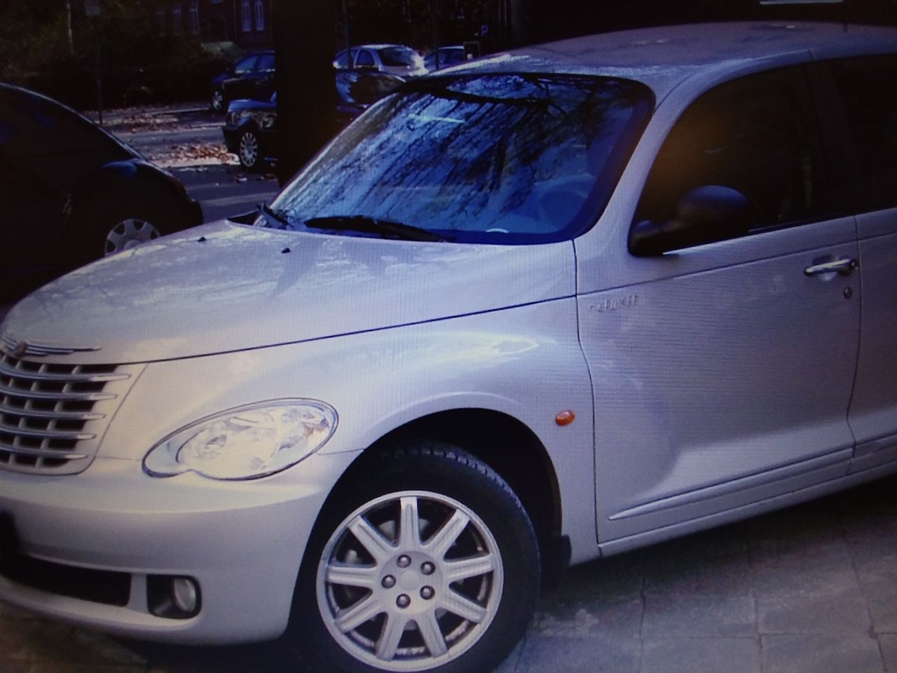 2009 Chrysler PT Cruiser | Rushmore, MN, Silver Steel Metallic Clear Coat (Silver), Front Wheel