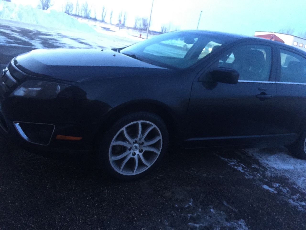 2012 Ford Fusion SEL | Sibley, IA, Tuxedo Black Metallic (Black), All Wheel