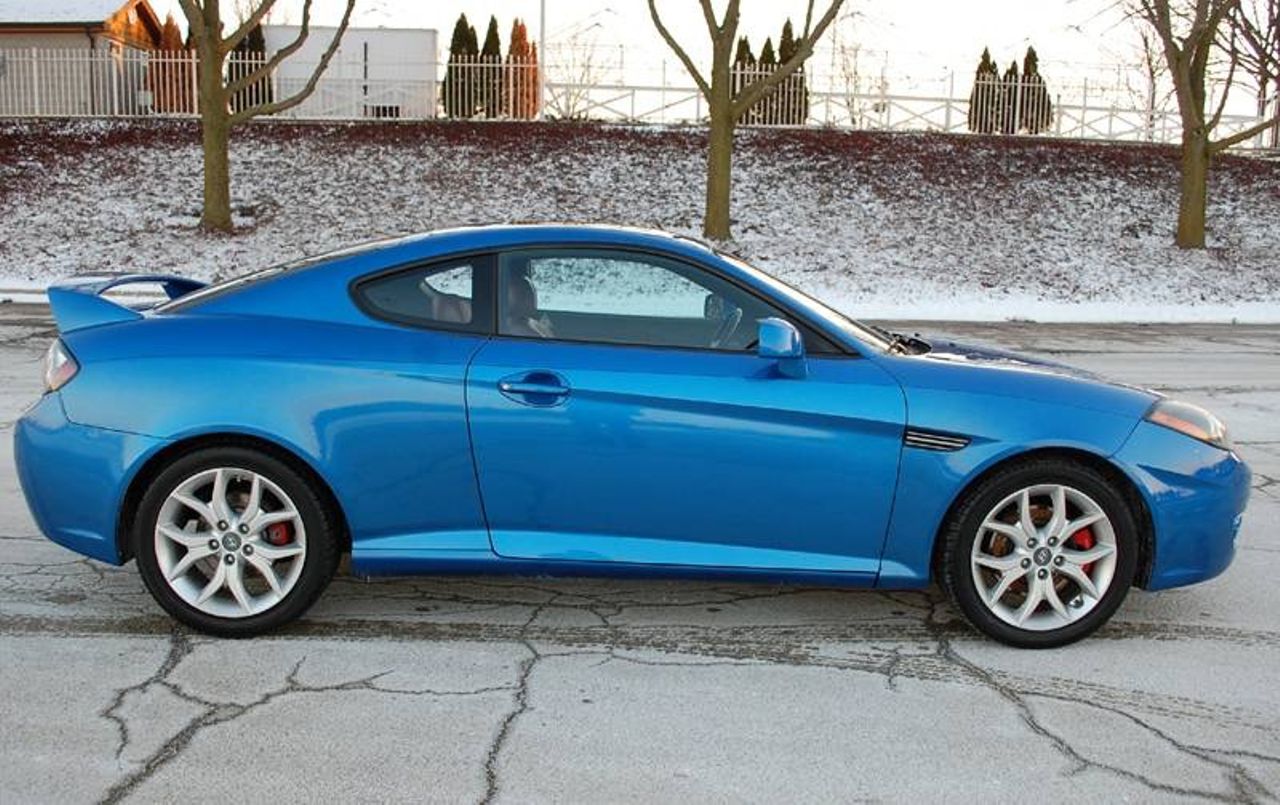 2007 Hyundai Tiburon SE | Sturgis, SD, Vivid Blue (Blue), Front Wheel