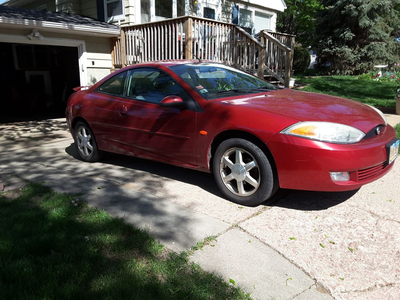 2002 Mercury Cougar Base | Sioux Falls, SD, Laser Red Tinted Clearcoat Metallic (Red & Orange), Front Wheel