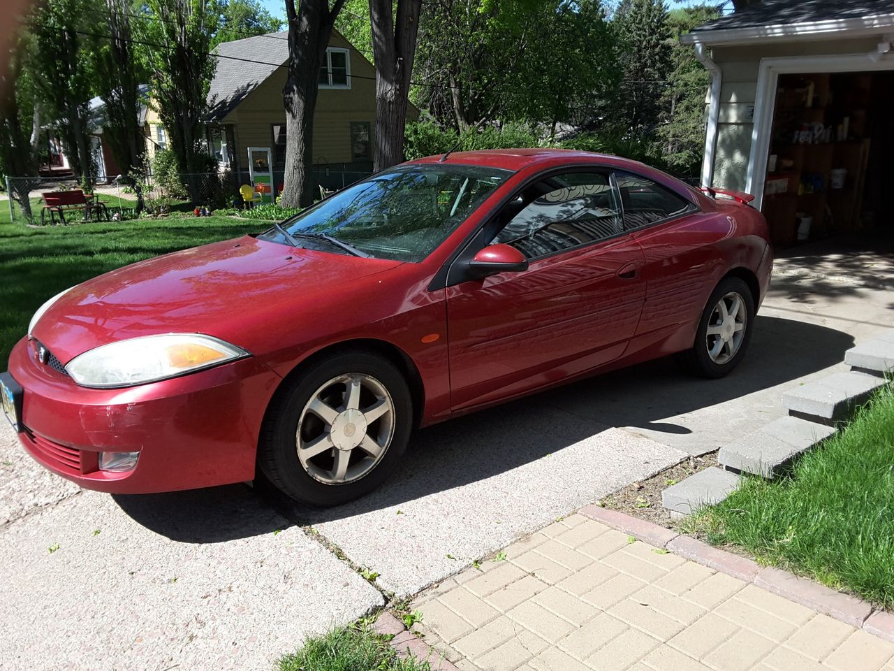 2002 Mercury Cougar Base | Sioux Falls, SD, Laser Red Tinted Clearcoat Metallic (Red & Orange), Front Wheel