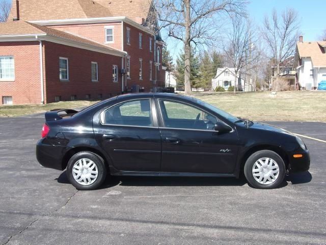 2004 Dodge Neon, Black Clearcoat (Black), Front Wheel