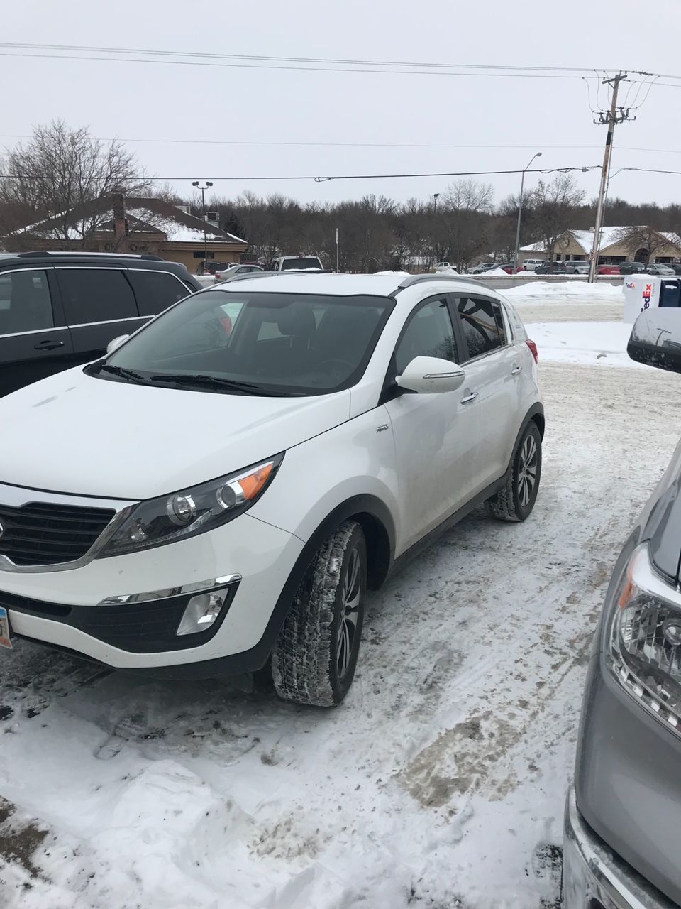 2011 Kia Sportage EX | Sioux Falls, SD, Clear White (White), All Wheel