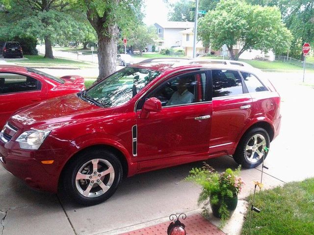 2014 Chevrolet Captiva Sport LT, Crystal Red Tintcoat (Red & Orange), Front Wheel